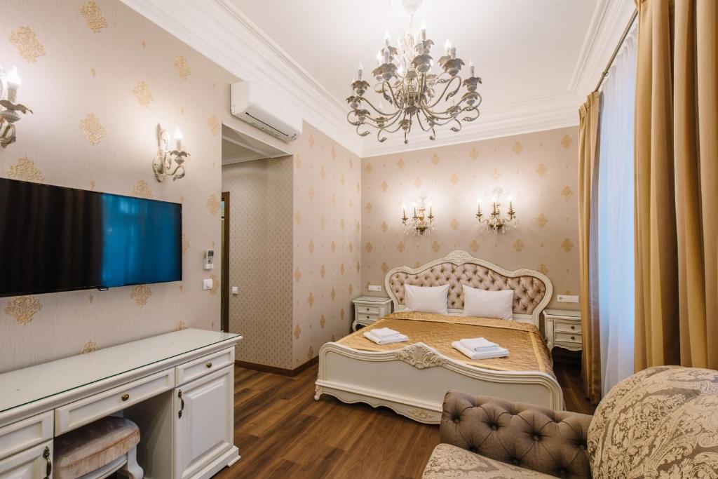 A bed or beds in a room at Nordian Classic in Kyiv