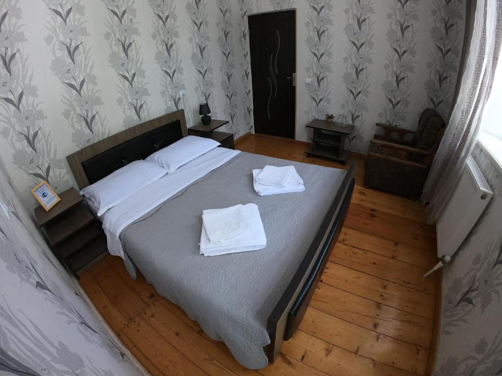 Postel nebo postele na pokoji v ubytování Host Family