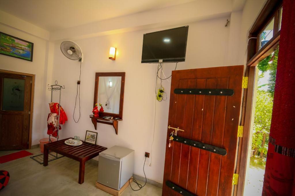TV a/nebo společenská místnost v ubytování Snuggle Cottage