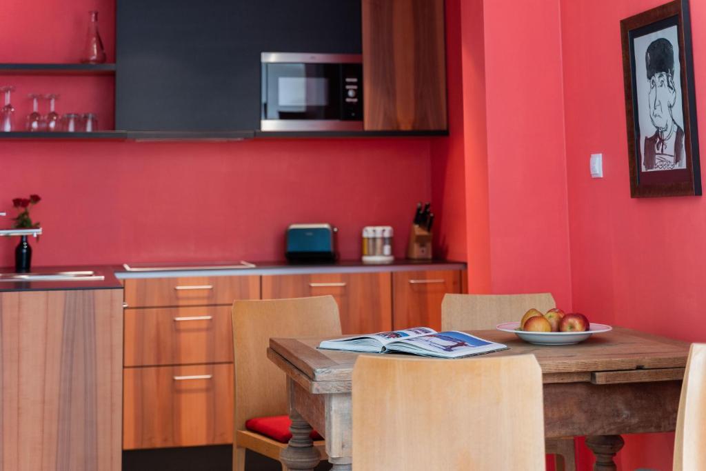 Kuchyň nebo kuchyňský kout v ubytování Alpinikum Apartments