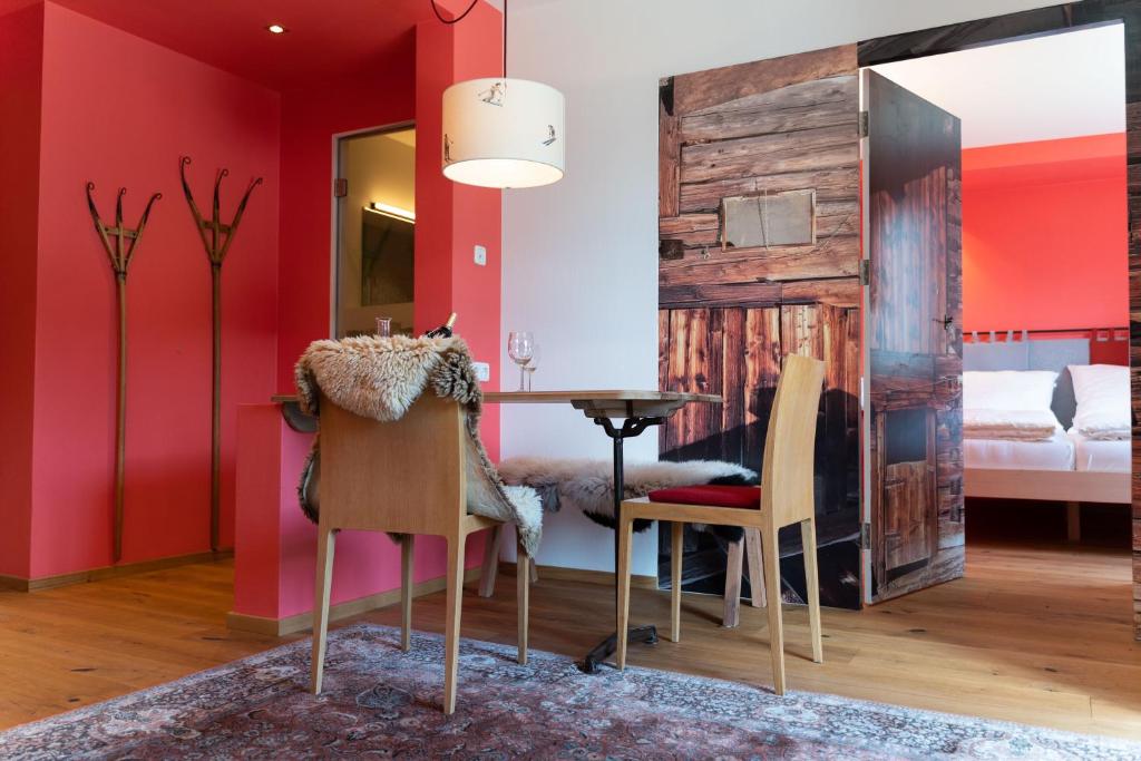 Postel nebo postele na pokoji v ubytování Alpinikum Apartments