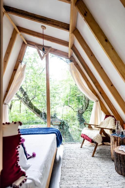 Postel nebo postele na pokoji v ubytování Duende Hotel