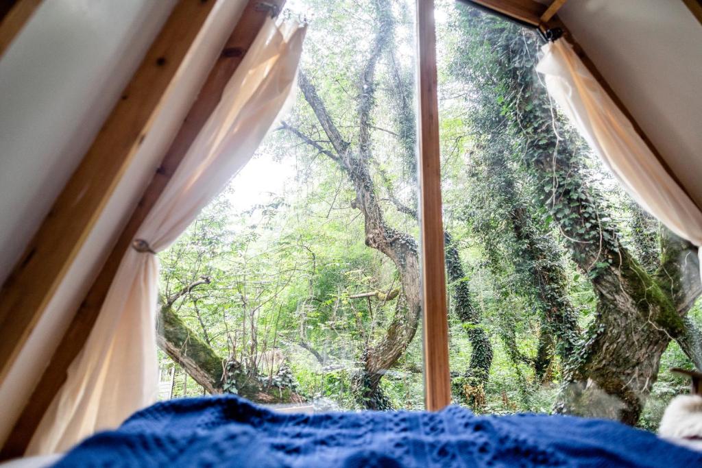 Postel nebo postele na pokoji v ubytování Duende Hotel