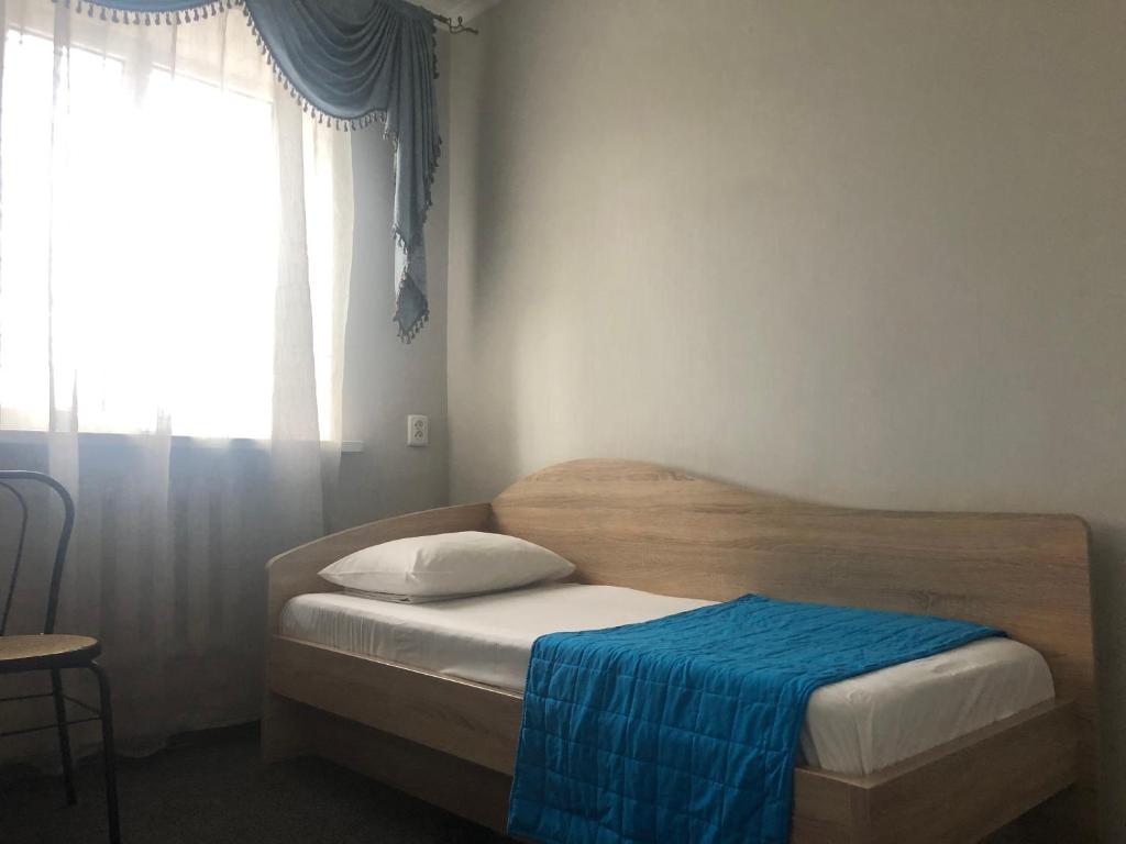 Postel nebo postele na pokoji v ubytování U Fedora
