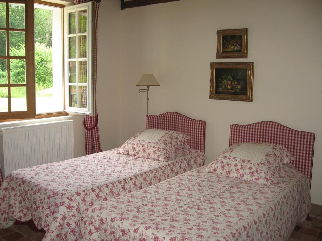 Postel nebo postele na pokoji v ubytování Les Vieux Guays