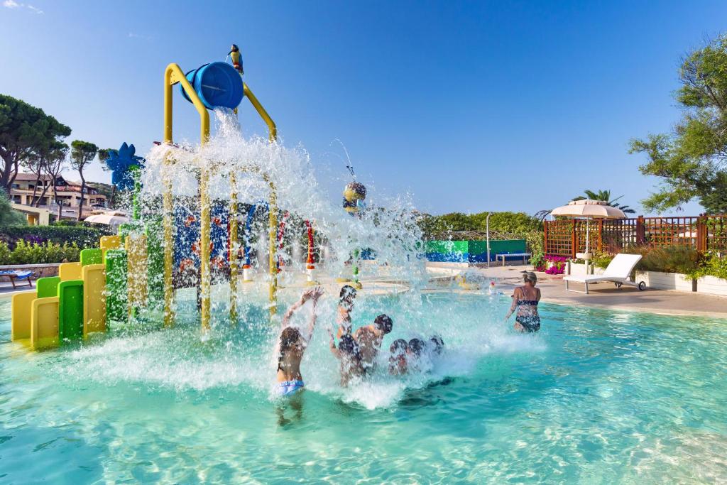 a group of children playing in a water park at Hotel Abi d'Oru in Porto Rotondo
