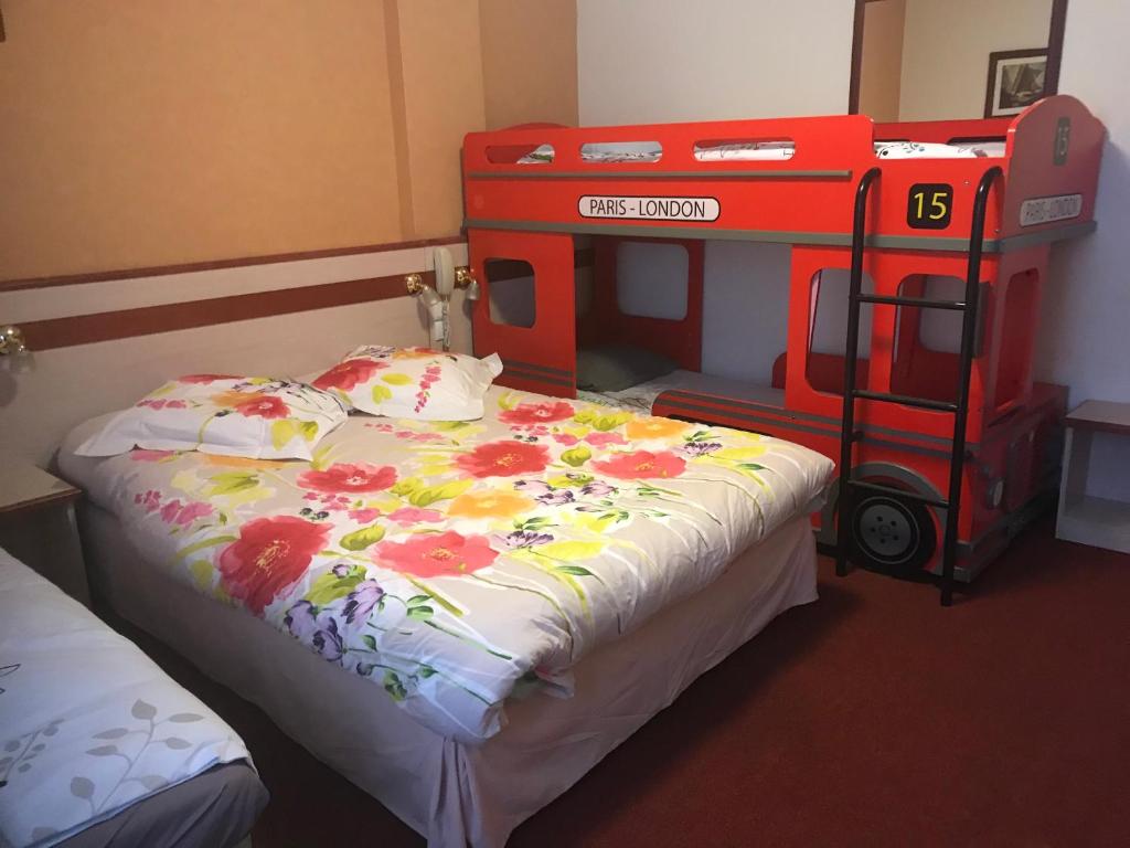 Postel nebo postele na pokoji v ubytování Hôtel Myosotis