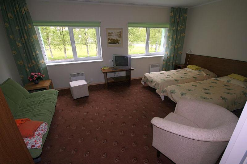 Postel nebo postele na pokoji v ubytování Hotell Sõnajala