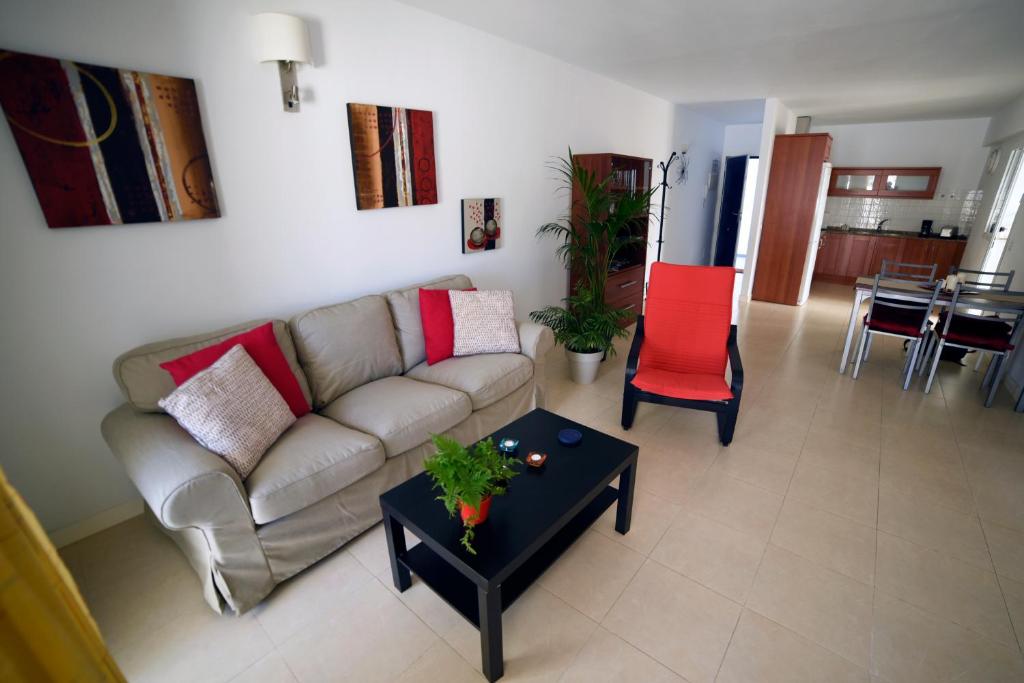 a living room with a couch and a table at Casa Lola in Agaete