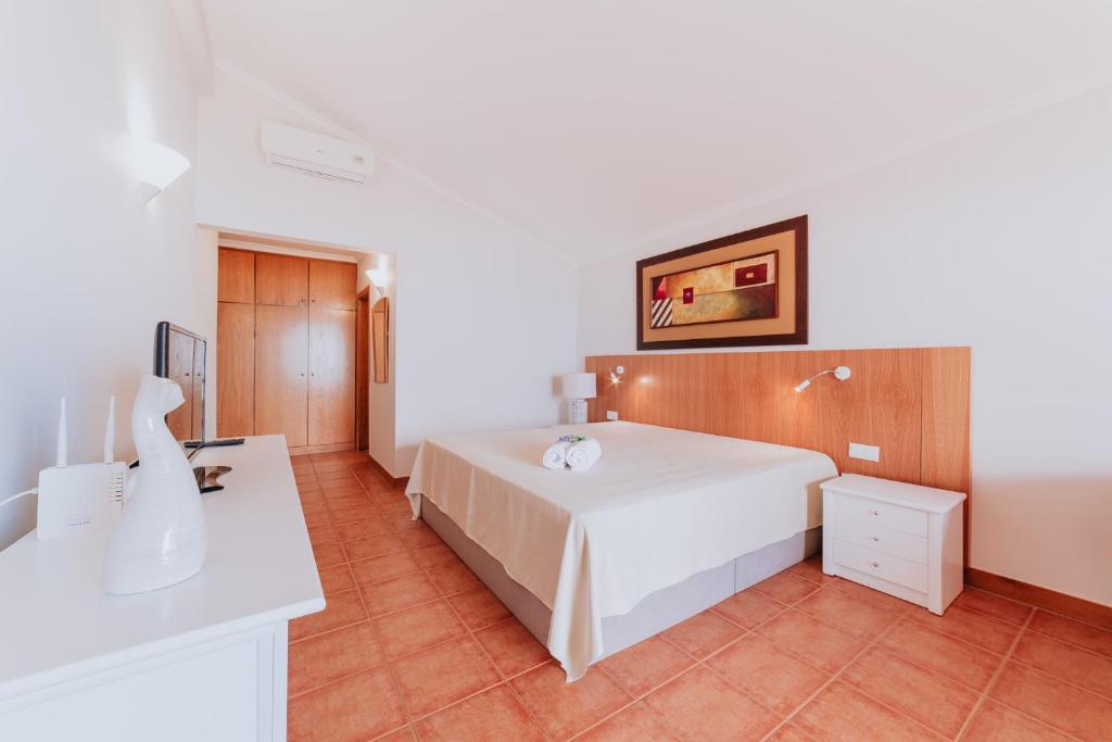 Postel nebo postele na pokoji v ubytování Villa Amore Accommodation