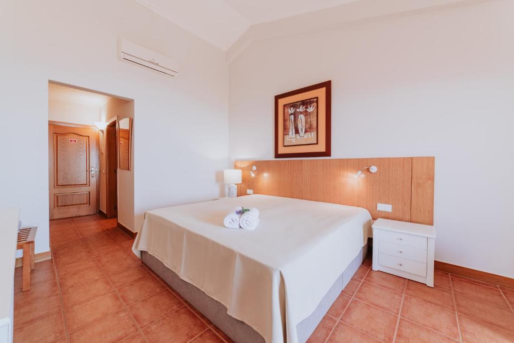 Postel nebo postele na pokoji v ubytování Villa Amore Accommodation