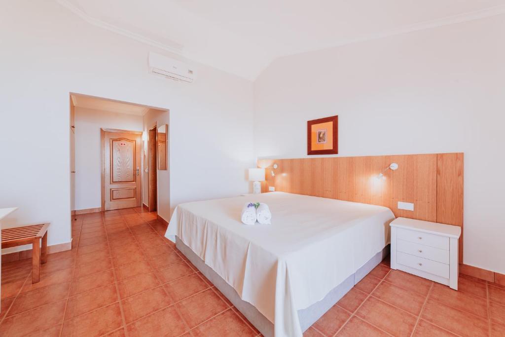 Postel nebo postele na pokoji v ubytování Villa Amore Accommodation