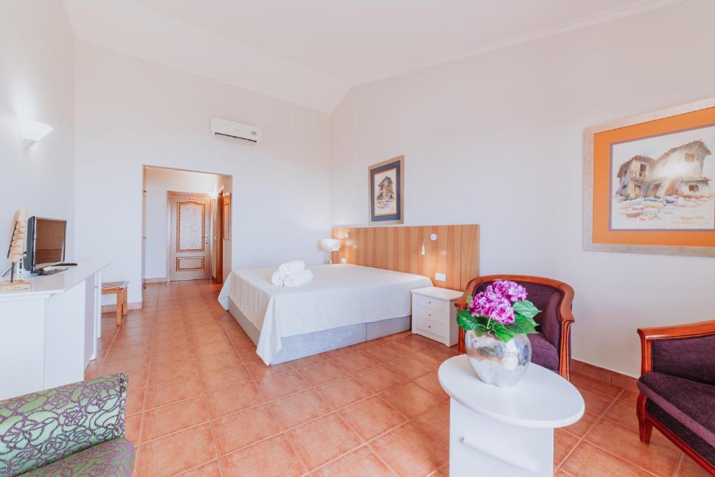 Postel nebo postele na pokoji v ubytování Villa Amore Accommodation