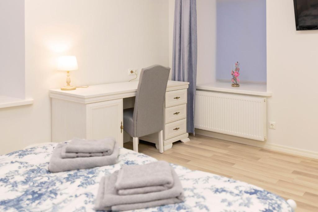 Postel nebo postele na pokoji v ubytování Mia Guesthouse