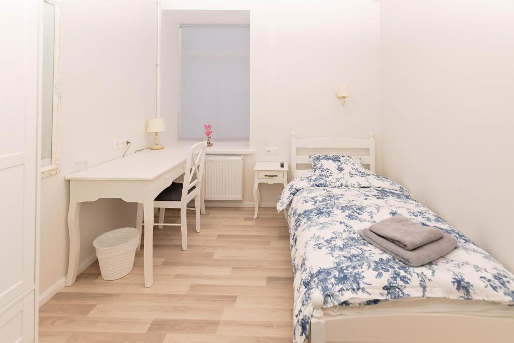 Postel nebo postele na pokoji v ubytování Mia Guesthouse