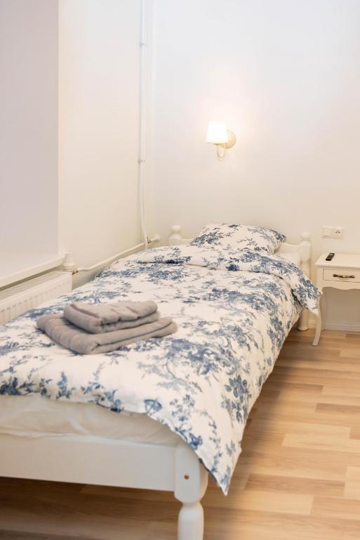 Postel nebo postele na pokoji v ubytování Mia Guesthouse