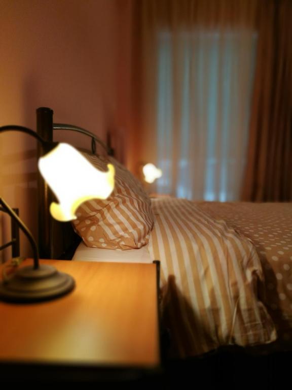 Postel nebo postele na pokoji v ubytování Platos Academy Apartment