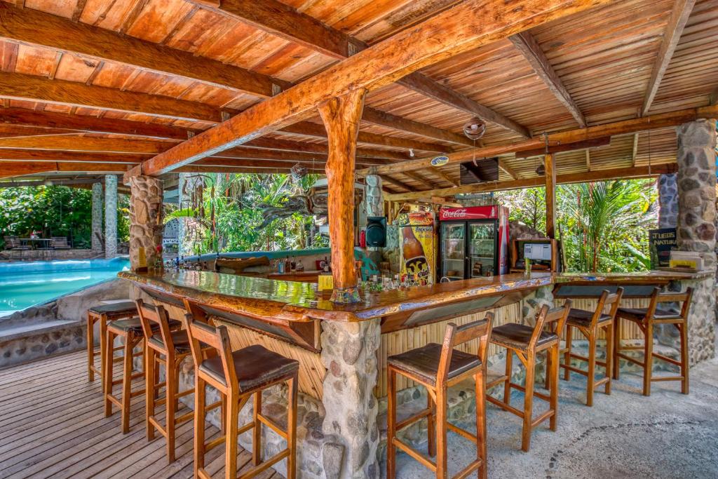 Bazén v ubytování Omega Tours Eco-Jungle Lodge nebo v jeho okolí