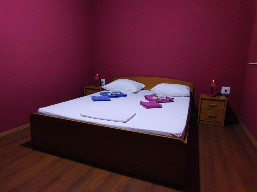 Postel nebo postele na pokoji v ubytování Apartments Leo Janjina