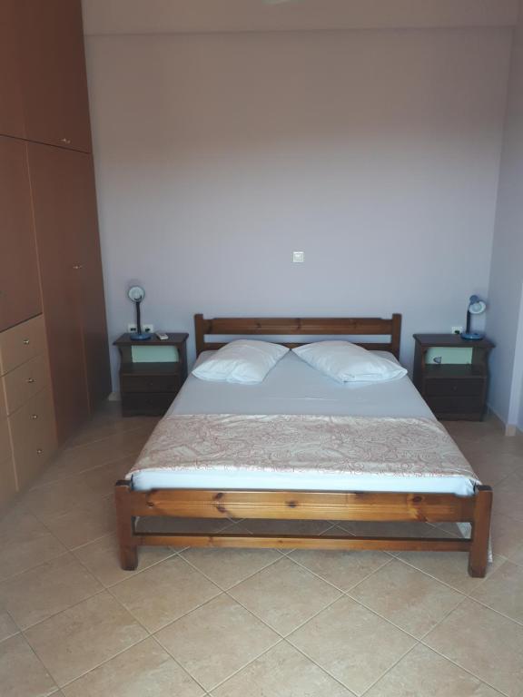 Postel nebo postele na pokoji v ubytování Mina Apartments