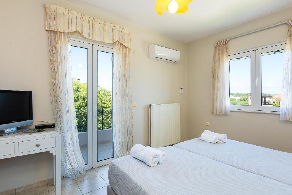 Posteľ alebo postele v izbe v ubytovaní Carpe Diem-Luxury Villa with private pool