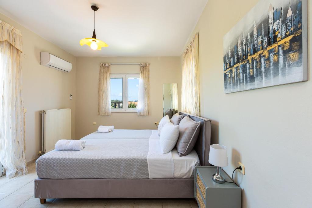 Posteľ alebo postele v izbe v ubytovaní Carpe Diem-Luxury Villa with private pool