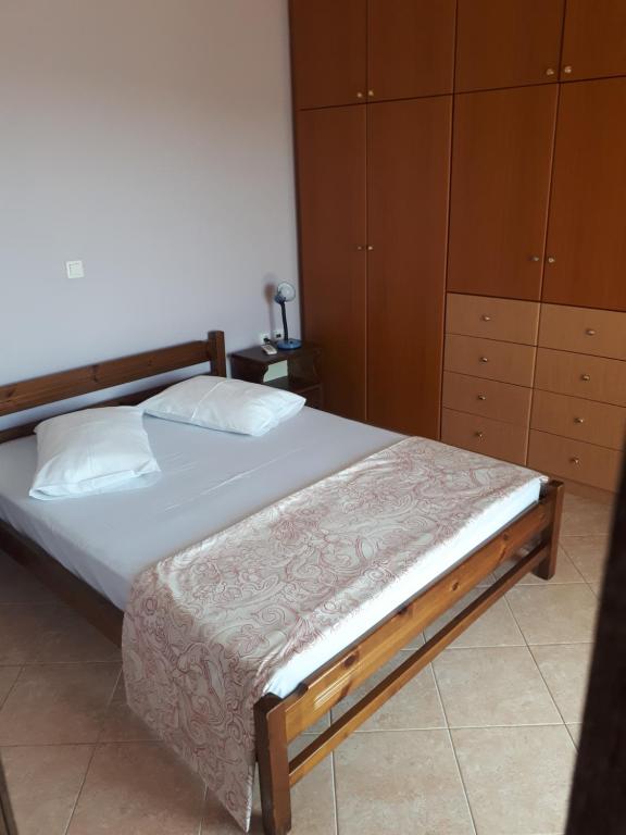 Postel nebo postele na pokoji v ubytování Mina Apartments