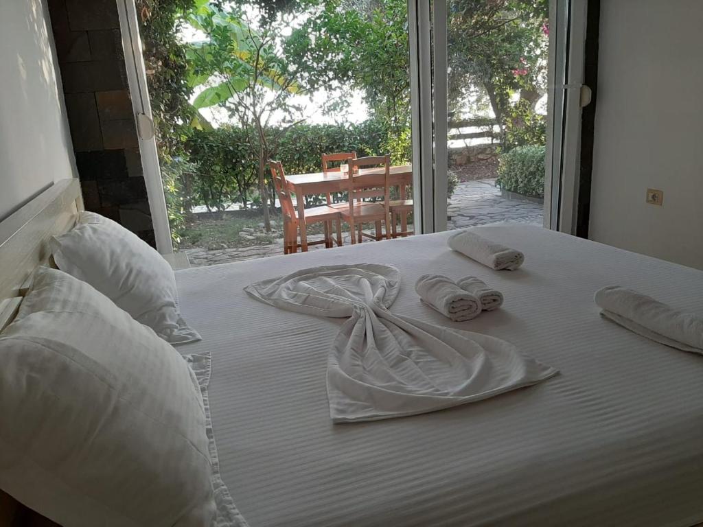 Postel nebo postele na pokoji v ubytování Olives Residence