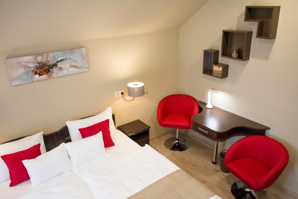 Postel nebo postele na pokoji v ubytování MeDoRa Park - Hotel MeDoRa***