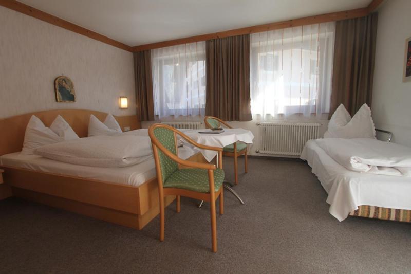 Postel nebo postele na pokoji v ubytování Pension Millinger