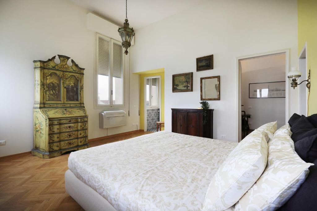 เตียงในห้องที่ CA SAN BIAGIO