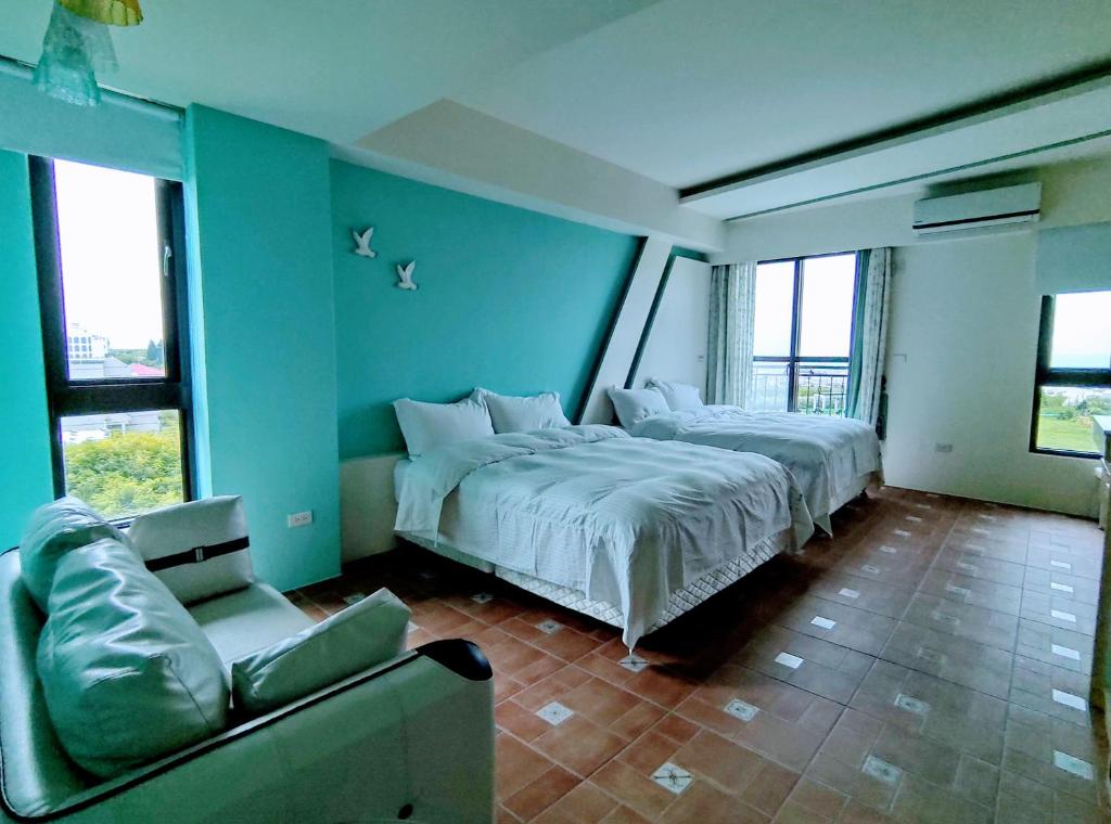 Postel nebo postele na pokoji v ubytování Shell Sand Homestay