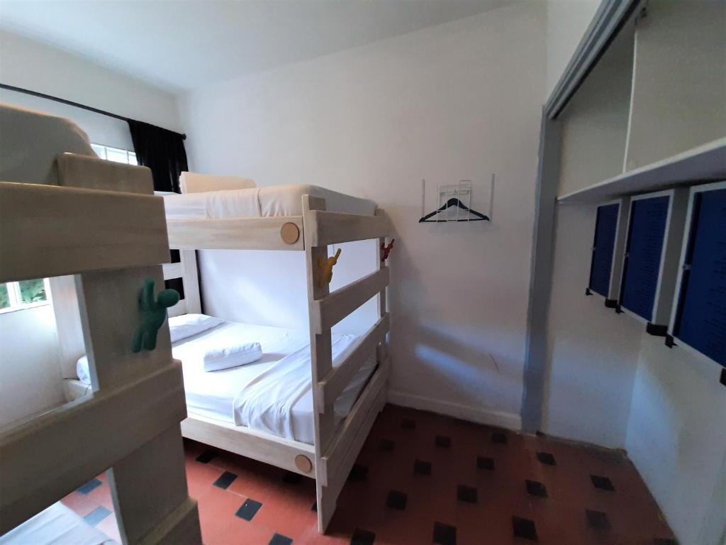 Postel nebo postele na pokoji v ubytování Noah boutique hostels Medellín