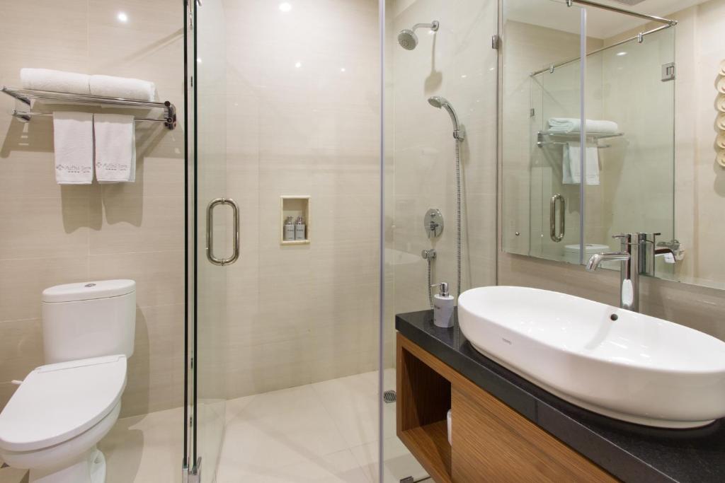 Koupelna v ubytování Adhi Jaya Hotel