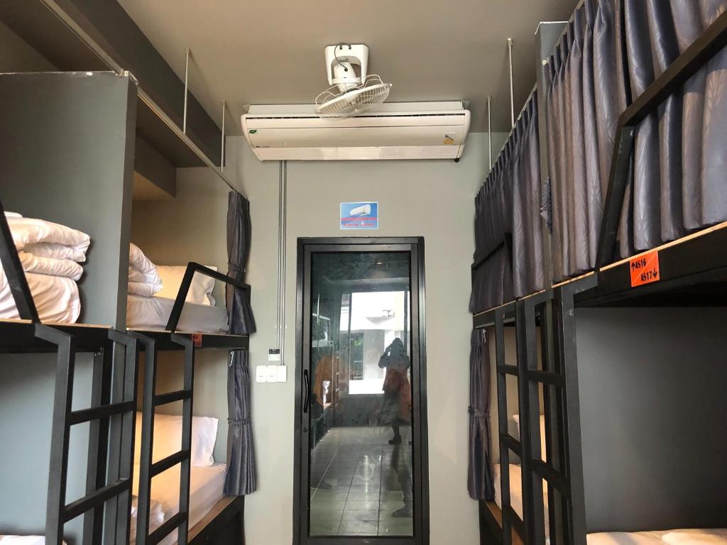 Postel nebo postele na pokoji v ubytování Aonang Sunset Hotel - SHA Extra Plus