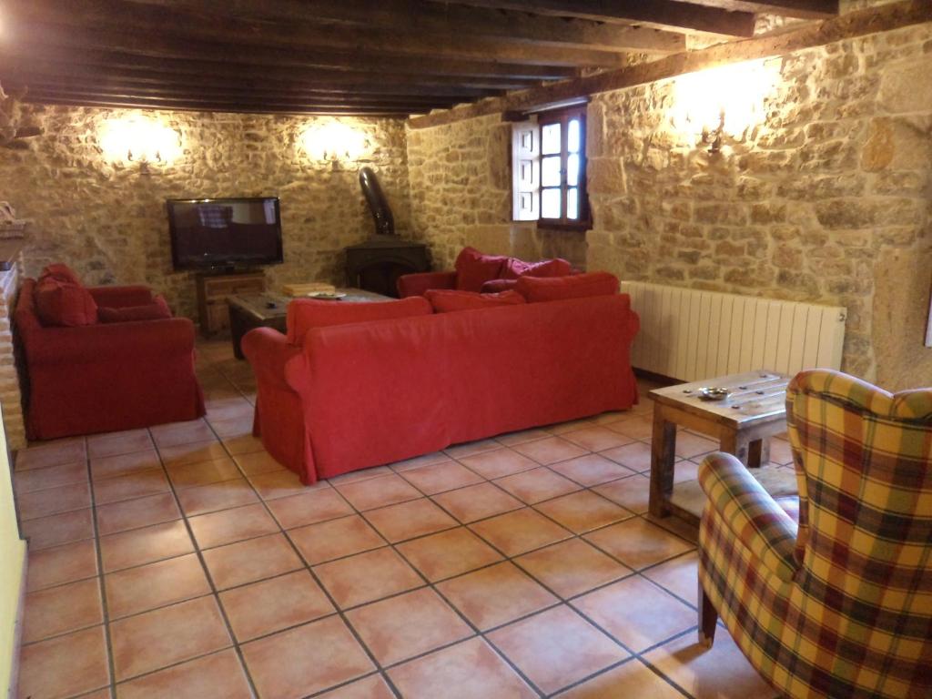 Posezení v ubytování Casa rural La Toba I y II