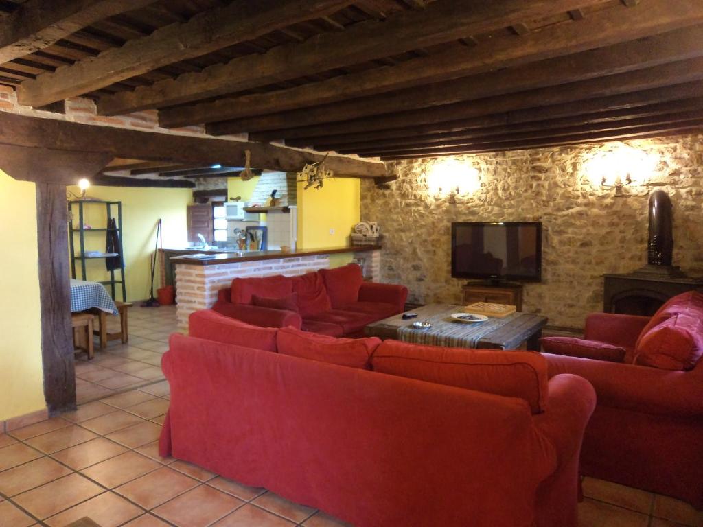 Posezení v ubytování Casa rural La Toba I y II
