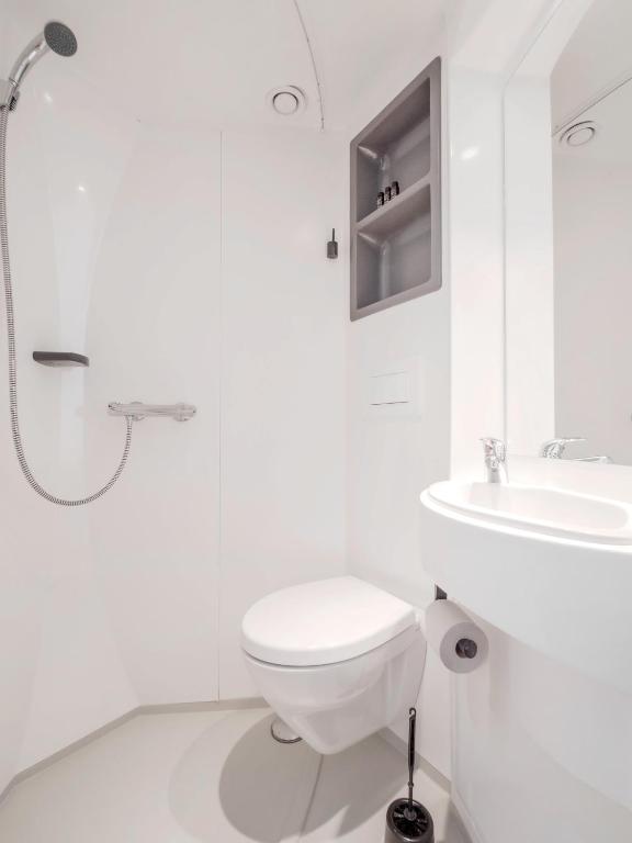 Koupelna v ubytování Hamnhotellet