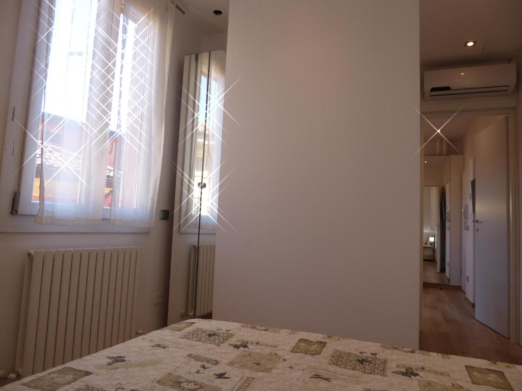 Łóżko lub łóżka w pokoju w obiekcie Giudei House Minisuite