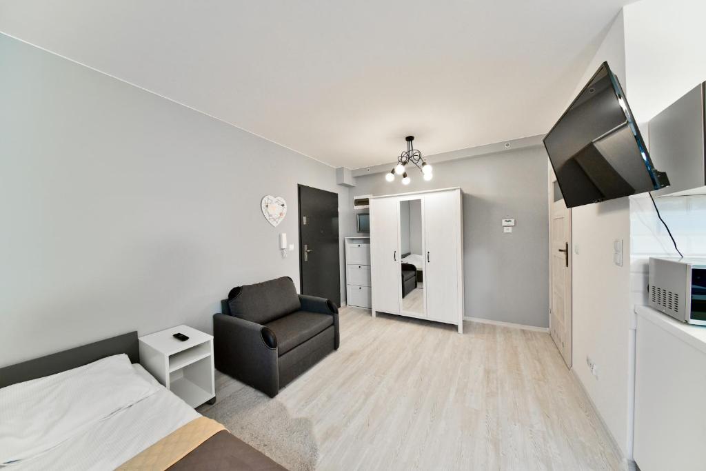 Kuchnia lub aneks kuchenny w obiekcie Apartament Szarotka - Apartamentuj