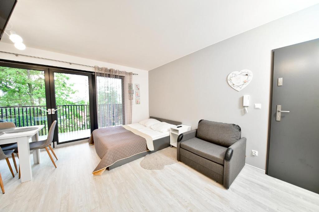Część wypoczynkowa w obiekcie Apartament Szarotka - Apartamentuj