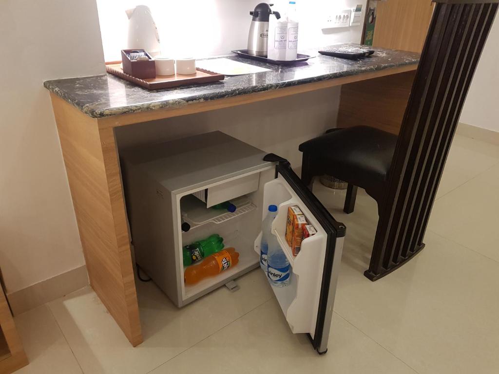 Kuchyň nebo kuchyňský kout v ubytování Roland Hotel