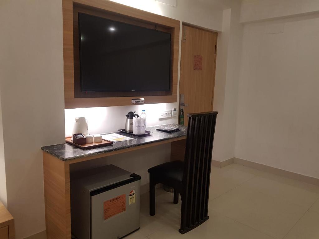 Kuchyň nebo kuchyňský kout v ubytování Roland Hotel