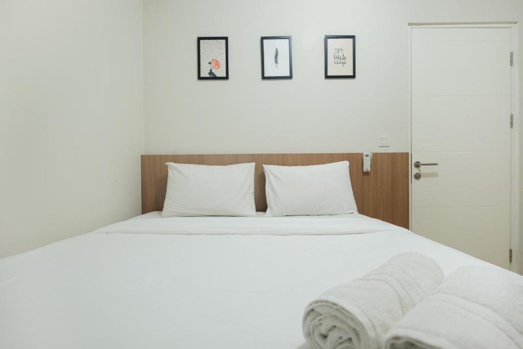 Postel nebo postele na pokoji v ubytování Modern and Bright 2BR Springlake Apartment By Travelio