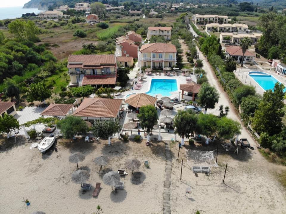 an aerial view of a resort with a pool at Sweet Dreams in Kavos