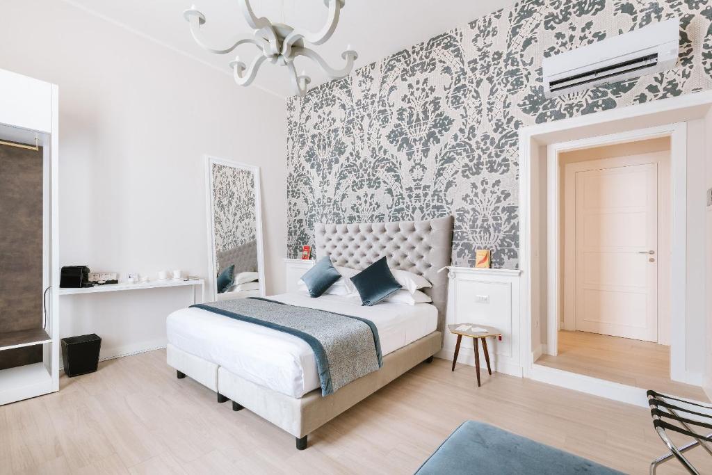 Cama ou camas em um quarto em Rhea Silvia Luxury Navona