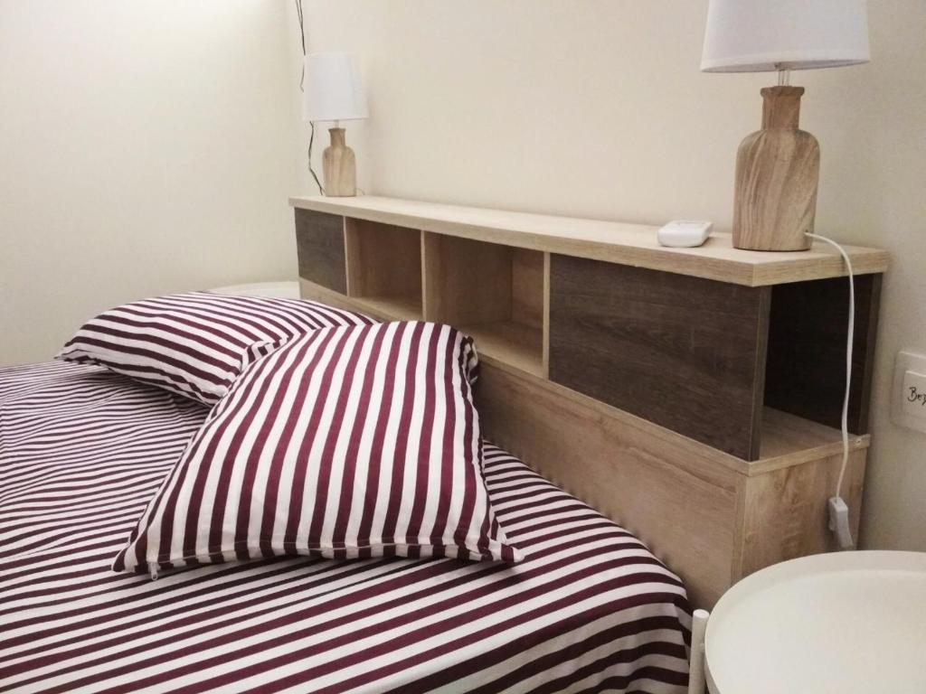 Posteľ alebo postele v izbe v ubytovaní Two Houses Neos Kosmos