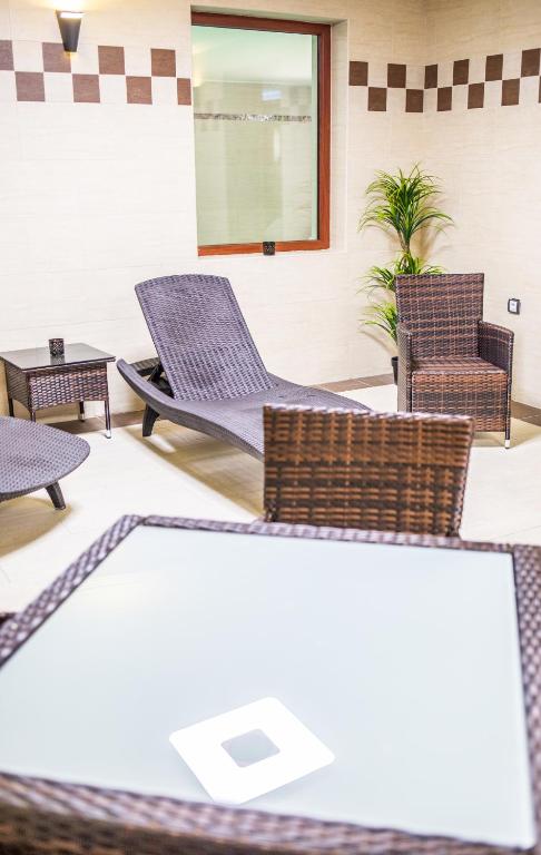 Posezení v ubytování Borhotel Sziluett Farkasmály
