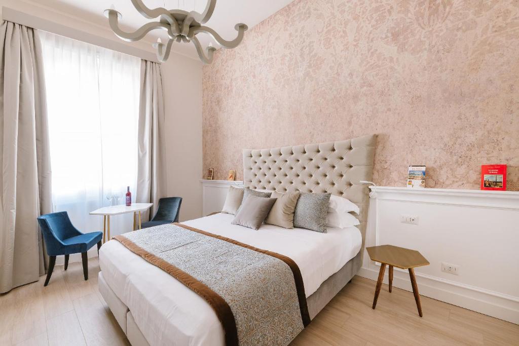 Cama ou camas em um quarto em Rhea Silvia Luxury Navona