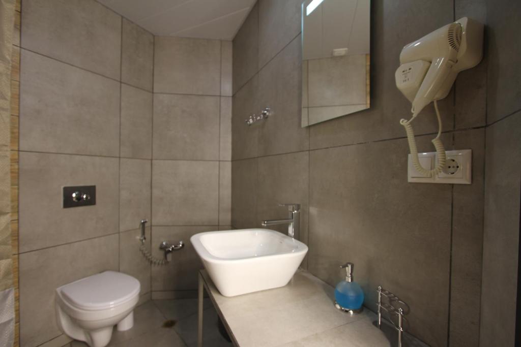 Koupelna v ubytování Apart-hotel TARHUN